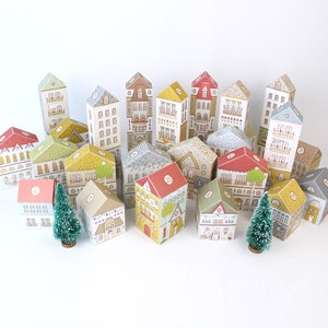 A set of 25 printable cardstock colorful houses used as an advent calendar for a Christmas countdown