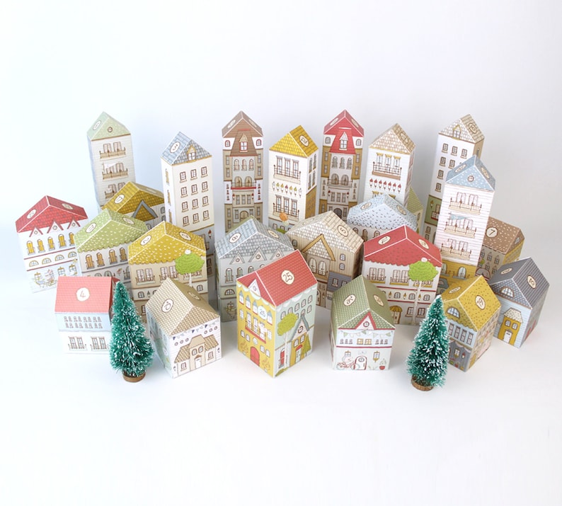 A set of 25 printable cardstock colorful houses used as an advent calendar for a Christmas countdown