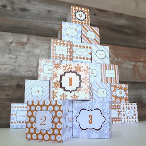 25 printable advent calendar boxes in silver and gold patterns