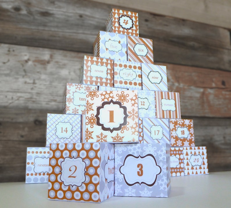 25 printable advent calendar boxes in silver and gold patterns