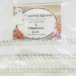 May include: Package of two white pillowcases with a floral pattern. The package label reads "Campus Square 140 Threads Per Sq. In. 100% Cotton 2 Pillowcases 42 x 36 Size Before Hemming RN 14494"