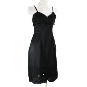 May include: Black slip dress with lace trim and adjustable straps. The dress is made of a smooth, silky fabric.