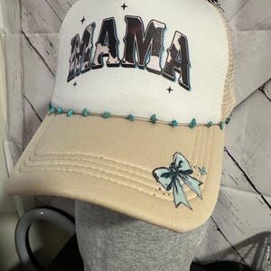 Light Beige & White Trucker Hat – Cowhide “Mama” Design with Turquoise Accents