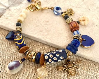 Pulsera de cuentas africanas con amuleto de Ganesh, ajustable