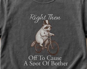 Waschbär auf Fahrrad T-shirt | 'Dann Aus Um Einen Fleck Ärger zu verursachen'