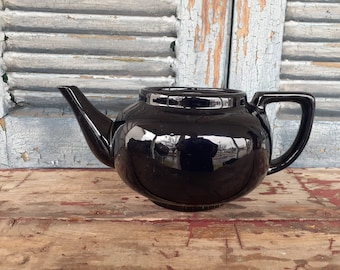 vintage black redware teapot holds 6 cups rounded shape