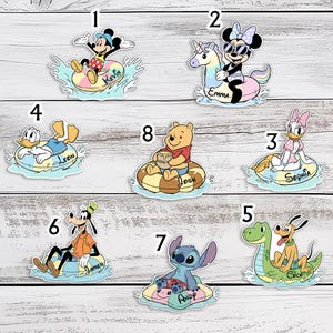 May include: A collection of colorful stickers featuring various cartoon characters on inflatable floats. Mickey Mouse, Minnie Mouse, Donald Duck, Daisy Duck, Goofy, Pluto, Winnie the Pooh, and Stitch are depicted with names on their floats.