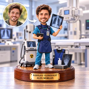 May include: A custom bobblehead figurine of a radiology technologist wearing blue scrubs and a navy lead apron, holding a chest X-ray. The base features a gold plaque reading RADIOLOGY TECHNOLOGIST ALEX MORGAN, next to a portable X-ray machine.
