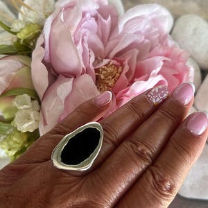 Adjustable elongated black ring in aged 12 micron silver plate