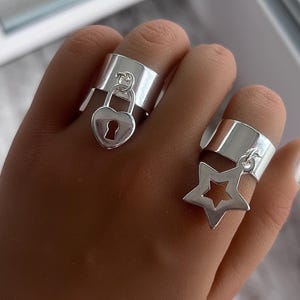 Adjustable star tassel or heart padlock charm rings in 10 micron silver plate