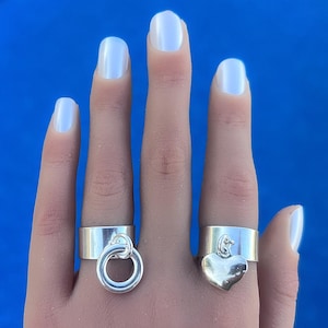 Adjustable tassel charm rings in 10 micron silver plated to choose from