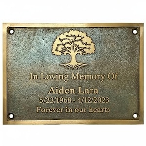 May include: Bronze memorial plaque with a gold border. The plaque features a tree design and the inscription "In Loving Memory Of Aiden Lara 5/23/1968-4/12/2023 Forever in our hearts."