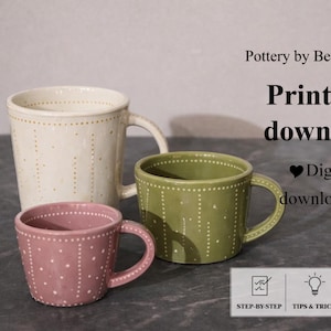 May include: Three ceramic mugs in cream, olive green, and pink, each with a handle and dotted pattern. The mugs are labeled "Pottery by Bettina Maria" and "Printable download, Digital download."