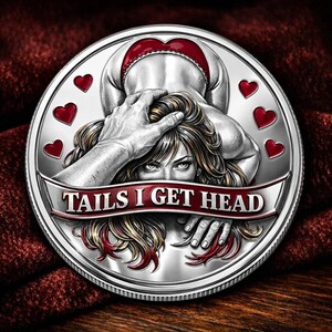 May include: A silver coin with a detailed illustration. The coin features a woman with long hair, a hand holding her head, and a figure bent over. The text "TAILS I GET HEAD" is on a banner. Red hearts are scattered around the coin.