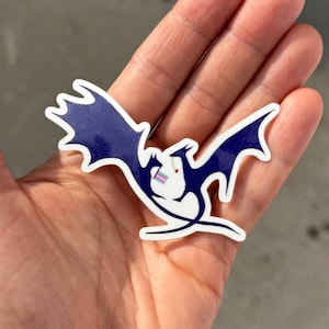 Sticker Queer Dragons – Créatures trans avec drapeau & fleur