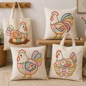 May include: Two off-white canvas tote bags and two square throw pillows, all featuring embroidered patchwork-style chicken designs with colourful floral and gingham patterns. The chickens are depicted in various poses, including sitting in a nest or basket.