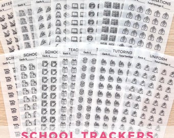 May include: A selection of school tracker stickers on translucent sheets. Each sheet features various school-related icons, including books, computers, and gifts. The text "SCHOOL TRACKERS" is displayed in pink at the bottom of the image.