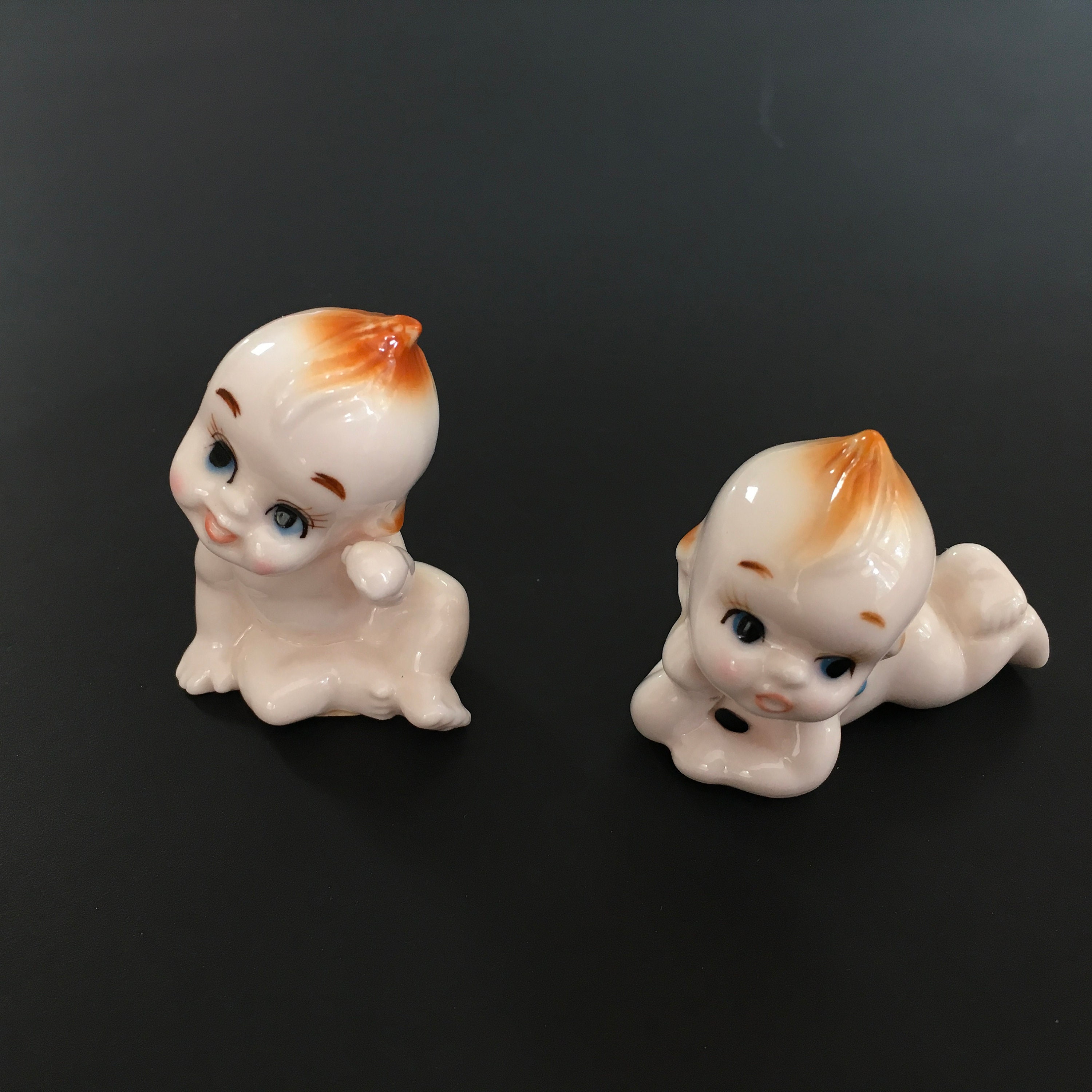 miniature kewpie dolls