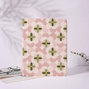 May include: A white ceramic mug with a black handle and the text "But First, Coffee" in a bold, black font. The mug is set against a neutral background, highlighting its simple design.