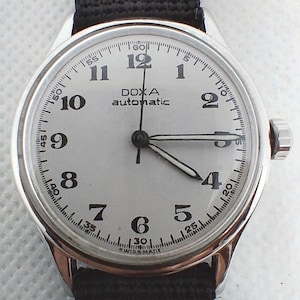 Miuksi – aiguilles de montre lumineuses vertes, no... – Grandado
