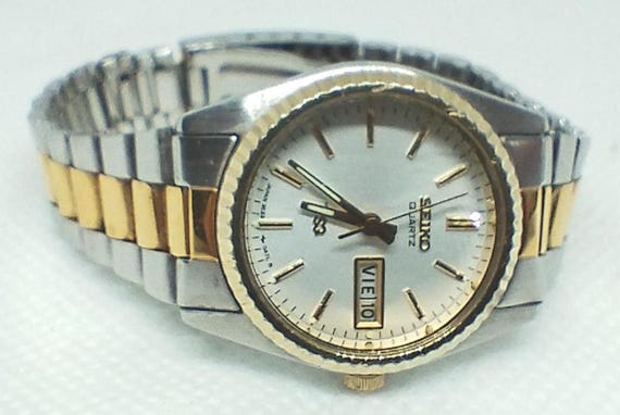 Montre Femme Seiko Vintage – Cadran Noir Et Bracelet Doré – Modèle 3E23-A69 – Années 80