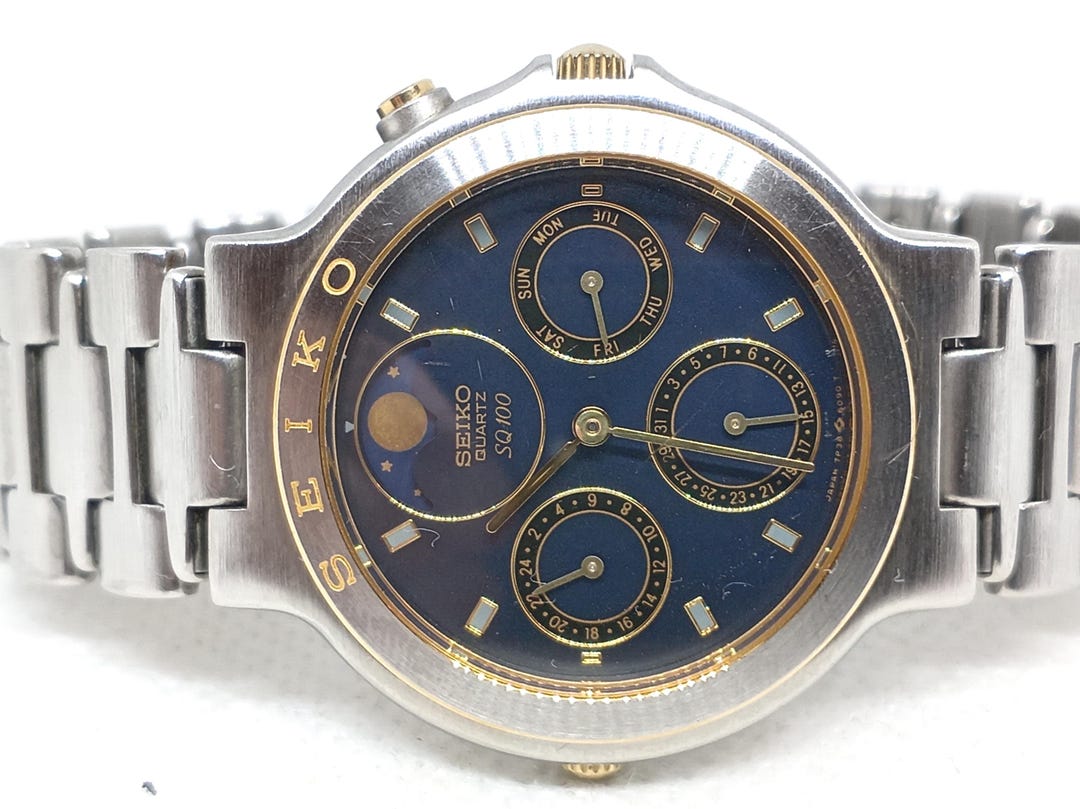 SEIKO SQ100 クォーツ 腕時計 コンビカラー il_1080xN.8024034416_olja.jpg