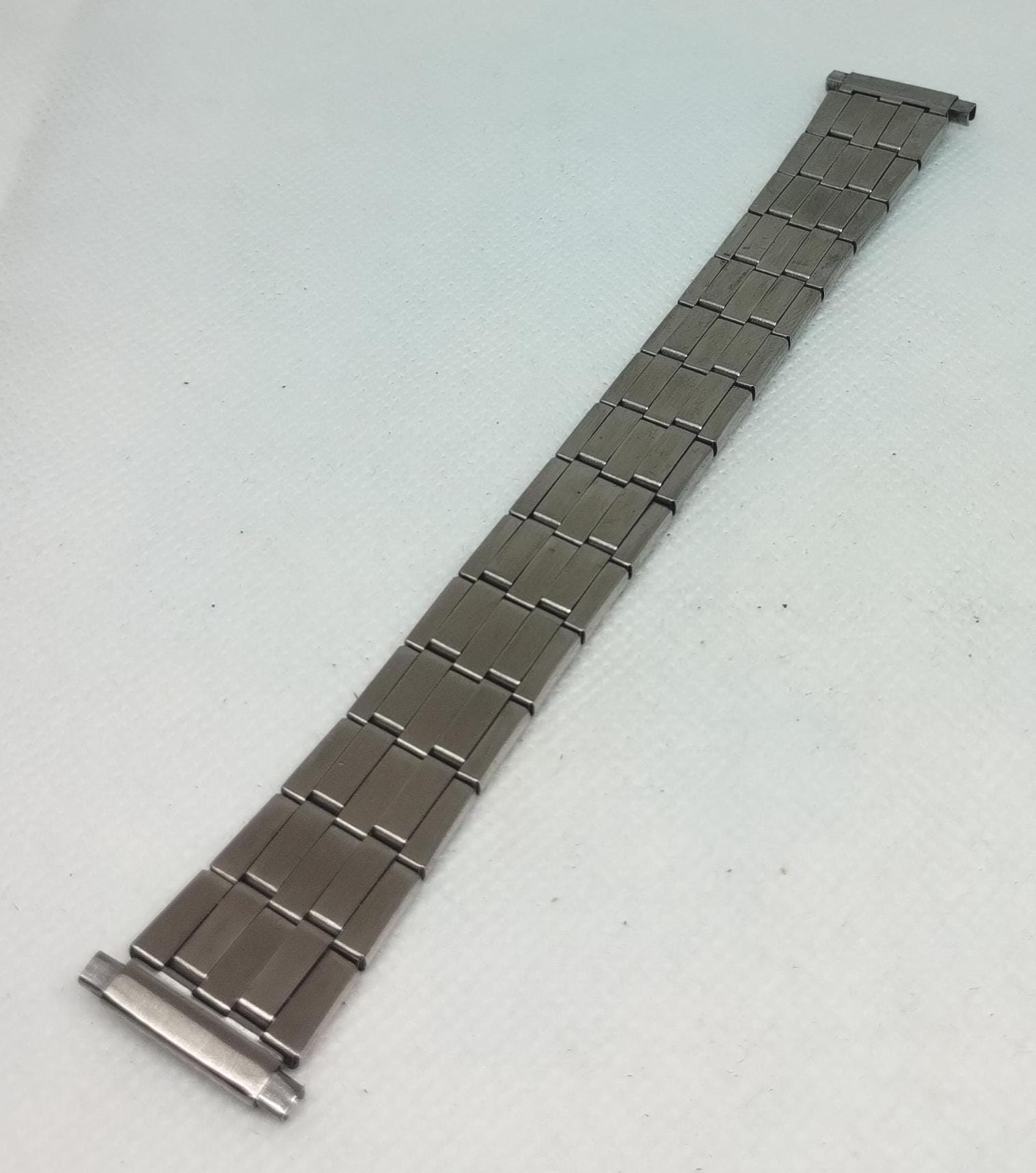 ヴィンテージ 18 mm メンズ腕時計 スチールブレスレット 70年代。NOS