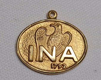 Vintage Insurance Company of North America Pendant, Gold Tone
