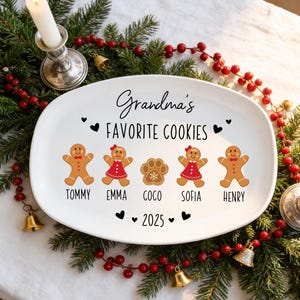 May include: White oval serving platter with the text "Grandma's Favorite Cookies" and the names Tommy, Emma, Coco, Sofia, and Henry. The platter features gingerbread people and a paw print design. The year 2025 is also displayed.