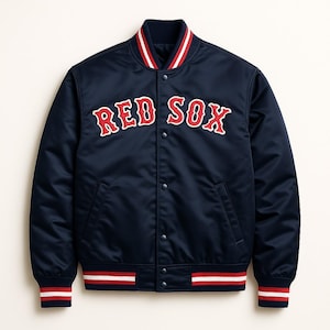 May include: Navy blue satin bomber jacket with the words "RED SOX" in red and white lettering across the chest. The jacket has a ribbed collar, cuffs, and hem with red and white stripes. Features a snap-button closure and two front pockets.