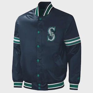 May include: Navy blue satin jacket with green and white striped accents. Features a green and white collar and cuffs. The left chest displays a team logo with the letter "S". Button-up front.