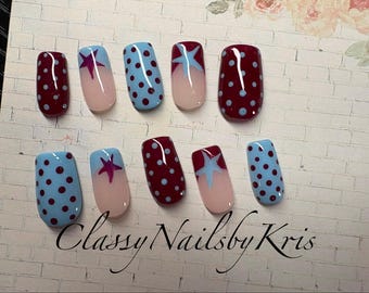 Blue and burgundy polka dots and stars. Hand-Painted Gel Nail Extensions.