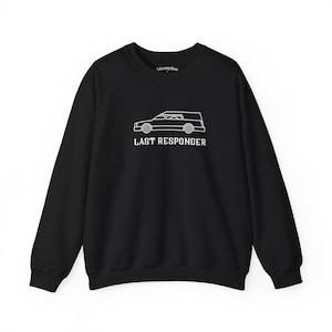 May include: Black crewneck sweatshirt with a white line drawing of a hearse and the words "LAST RESPONDER" in a bold, sans-serif font. The sweatshirt has long sleeves and a classic, casual style.