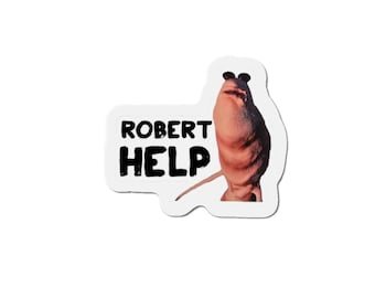 May include: A white sticker with the text "ROBERT HELP" in black, featuring a cartoonish, brown creature with sunglasses. The creature has a long, thin tail and is set against a white background.
