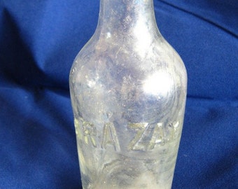 Vintage old antique embossed Brazay hand blown cute small bottle