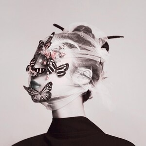 May include: A woman with a veil over her face has butterflies covering her eyes. The text "Close your eyes and you will see" is written below her.