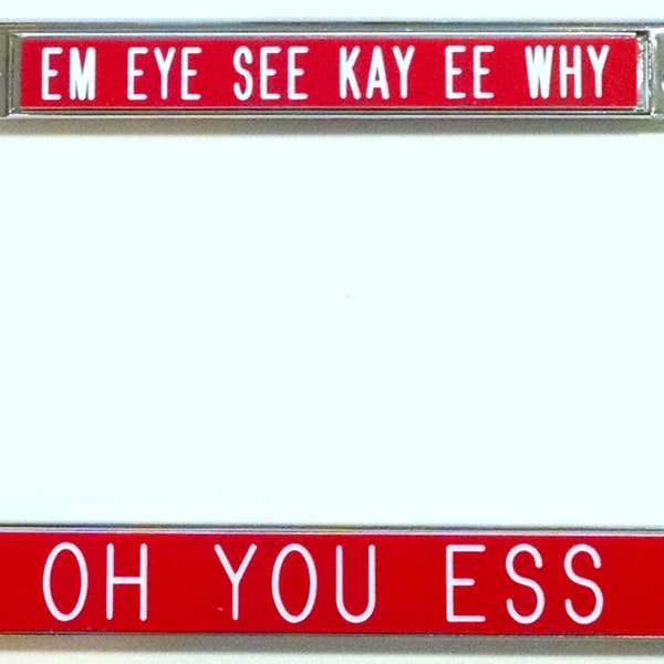 Em Eye See -  license plate frame red background