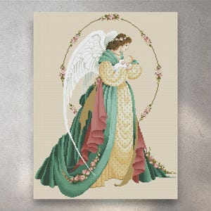 May include: Cross-stitch image of an angel holding a baby, surrounded by a floral halo. The angel wears a green, yellow, and pink gown with floral details. White wings are visible. The background is a neutral beige colour.