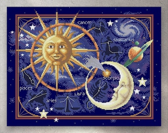 May include: A cross-stitch artwork featuring a celestial theme. The design includes a smiling sun, a crescent moon with a face, and various zodiac constellations like Cancer, Sagittarius, and Aries, set against a dark blue starry background.