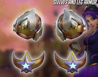 May include: Digital product featuring 3D-printed armor pieces. The image displays two sets of gold and silver-colored sleeve armor and leg armor with star-shaped accents. Text at the top reads "FRESHMAN TEO MINH JUNO SLEEVES AND LEG ARMOR".