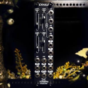 May include: Black TEMBRA modular synthesizer module labelled EXHALE. It features independent Attack and Release outputs, with mixed outputs combining both stages. The module has multiple input and output jacks and a series of dials and indicators.