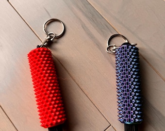 Llavero antiestrés Clicky: agarre sensorial impreso en 3D para concentración y alivio del estrés