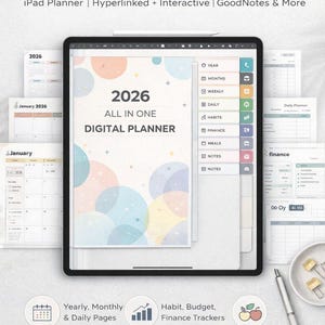 以下が含まれることがあります： 2026年のデジタルプランナーがタブレットに表示され、年間、月間、日々の計画オプションがあります。習慣、財務、食事、メモのセクションが含まれています。 スタイラスとカレンダーページも表示されています。
