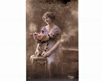 Unused French Ste. Catherine Postcard - Woman with a Vase Flowers