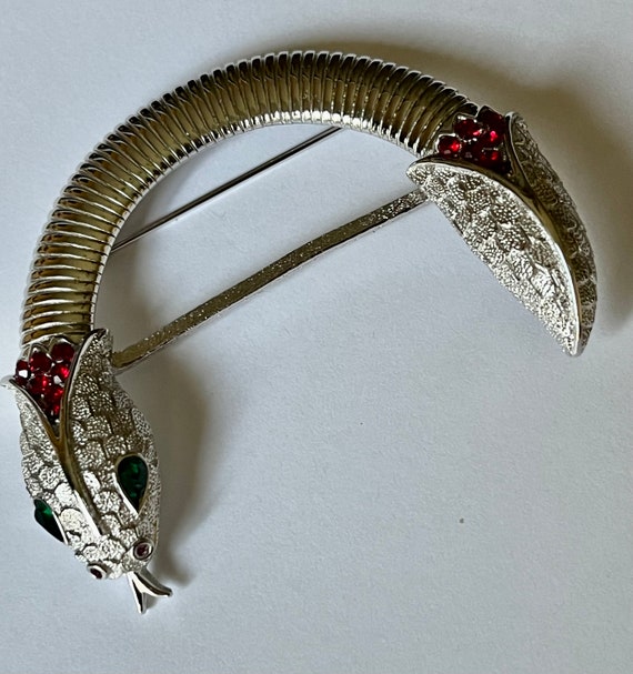 Trifari rhinestone curved snake brooch