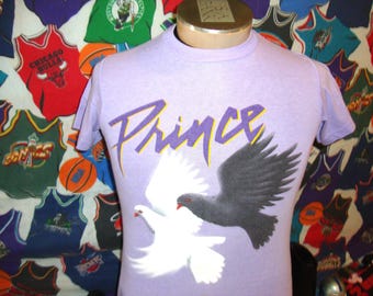 Camiseta vintage de los 80 de Prince and The Revolution, promoción de la película Purple Rain, 1984-1985, gira de conciertos When The Doves Cry, fina, talla S pequeña.