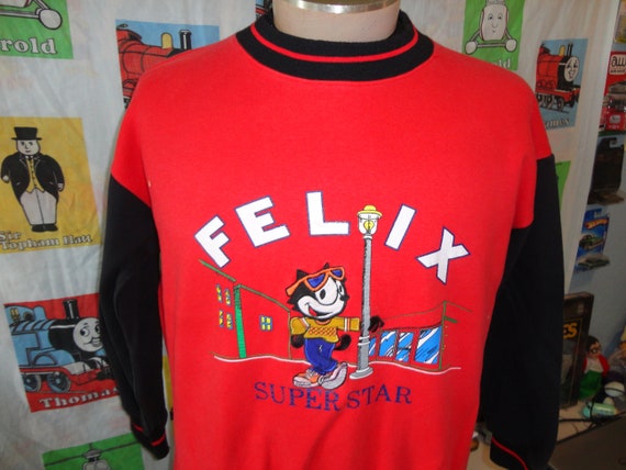 Felix the sales cat jumper