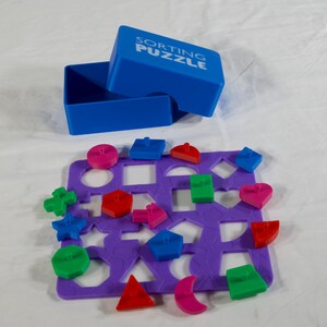 Juego de rompecabezas de formas, aprendizaje temprano, Montessori, aprende formas y desarrolla la motricidad fina. Incluye caja de almacenamiento. Colorido y divertido.
