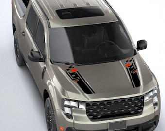 May include: A beige pickup truck featuring a black and orange geometric hood decal. The vehicle has a black front grille, black side mirrors, and a sunroof. The hood graphic consists of two symmetrical vertical stripes with rectangular accents.