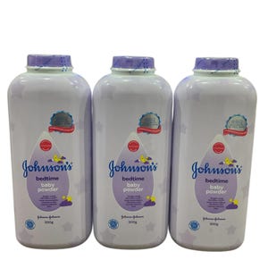 May include: Three white Johnson's Bedtime Baby Powder bottles with purple lids and labels. The labels feature the brand name, product name, and a teardrop-shaped design with a moon and stars. Each bottle contains 300g of powder.